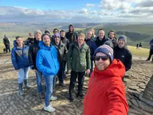 Group of people at top of Mam tor Peak District